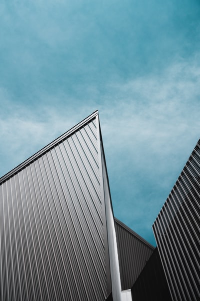 gray concrete building under blue sky during daytime